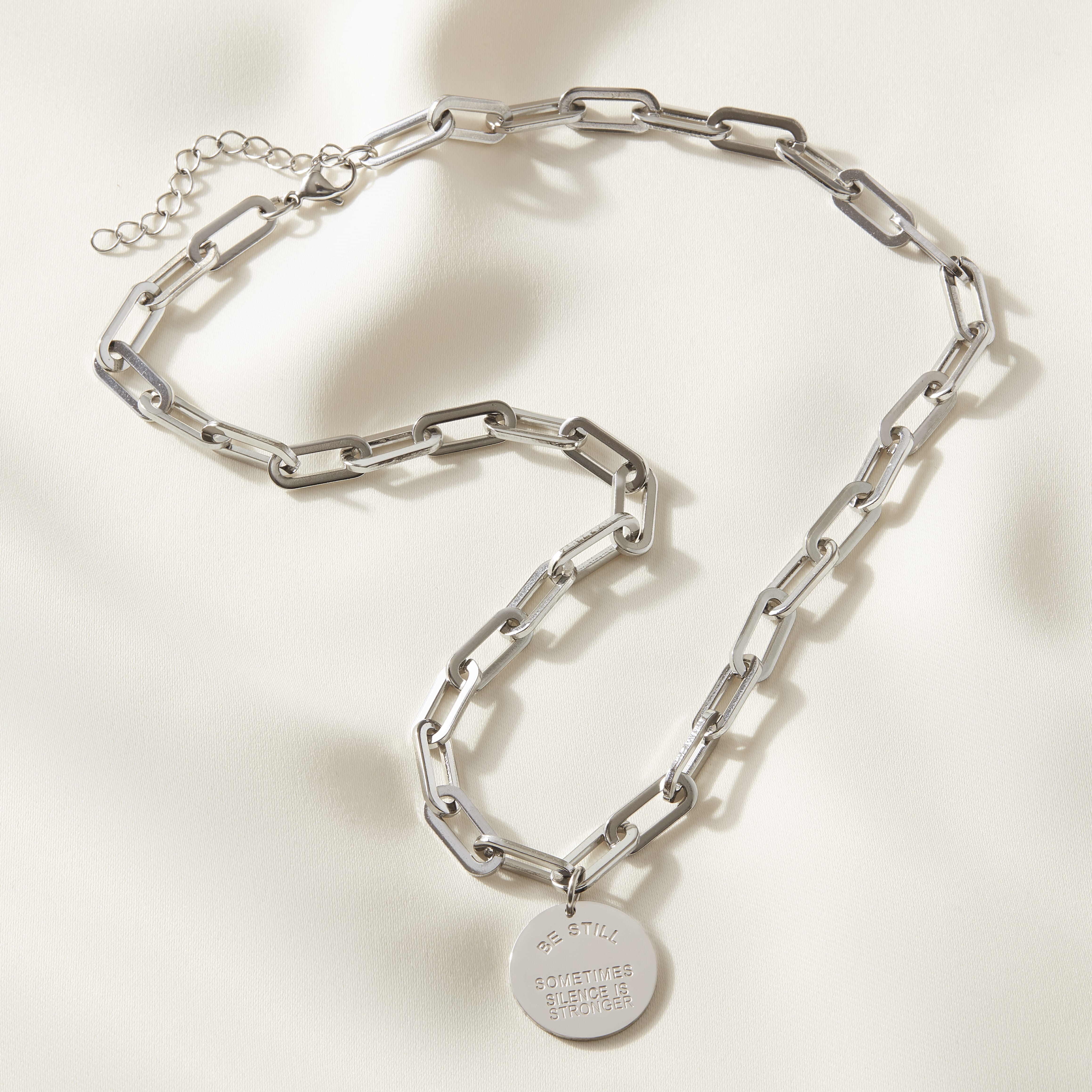 'Be still: sometimes silence is stronger' Necklace Silver