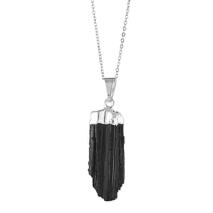 a black tourmaline crystal pendant on a sterling silver chain