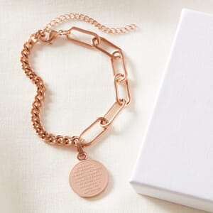 photo of reverse Serenity dual stainless steel Rose gold bracelet placed on cream cloth next to a Soul Analyse box