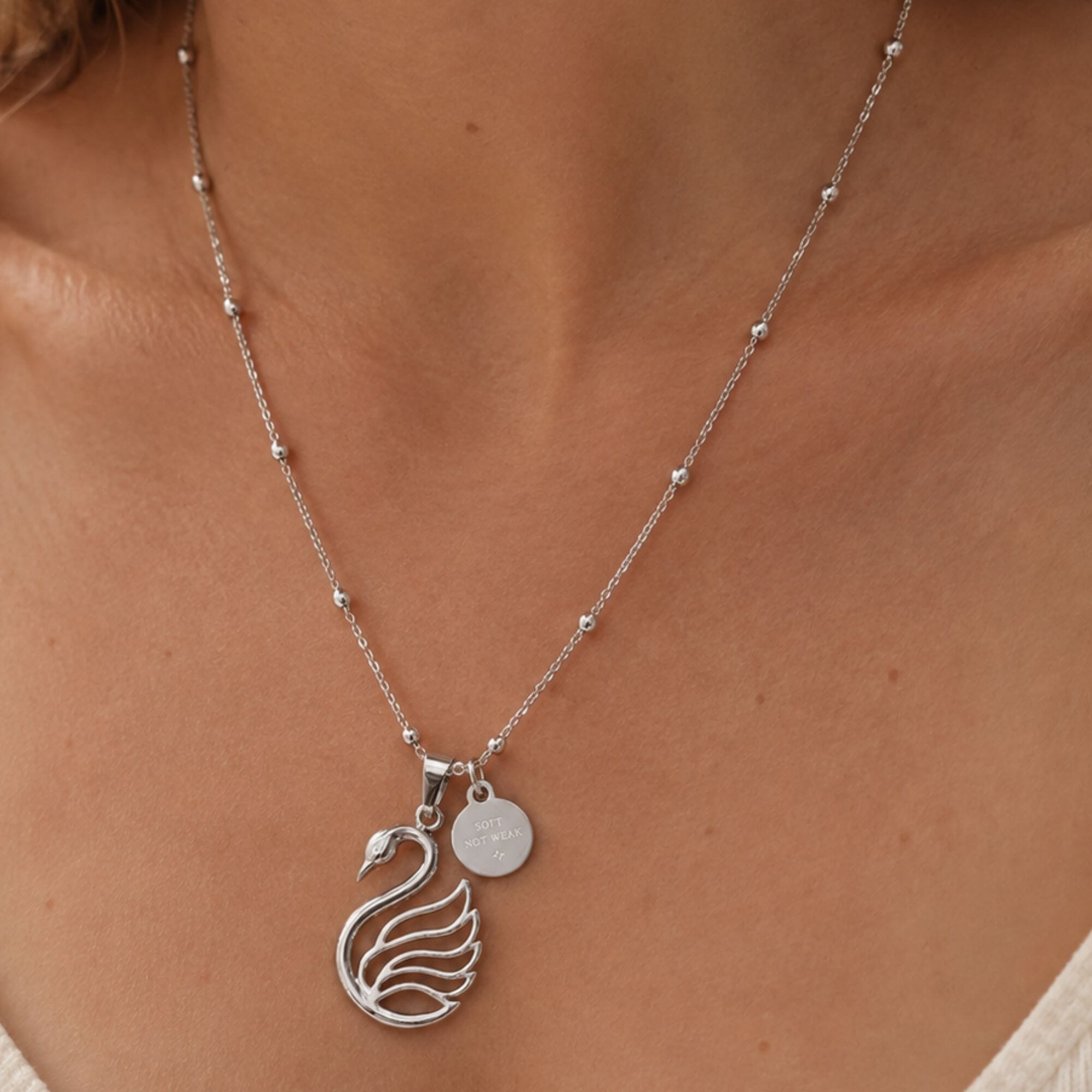 Swan-Necklace_-Soft-Not-Weak-Silver-Worn.jpg?w=1024&h=1024&scale
